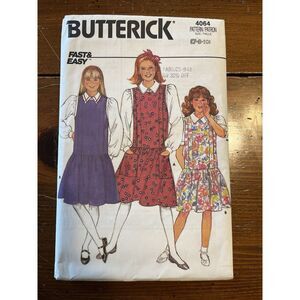 Vintage Butterick sewing pattern #4064 for girls dress and blouse. Classic late